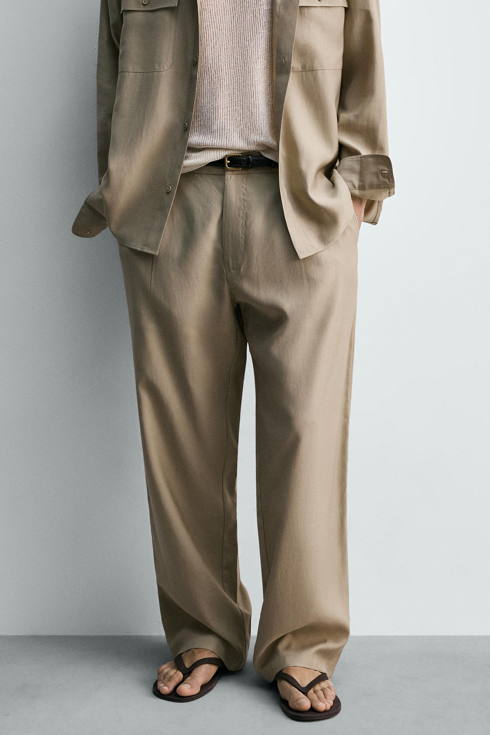 FLOWY PLEATED PANTS